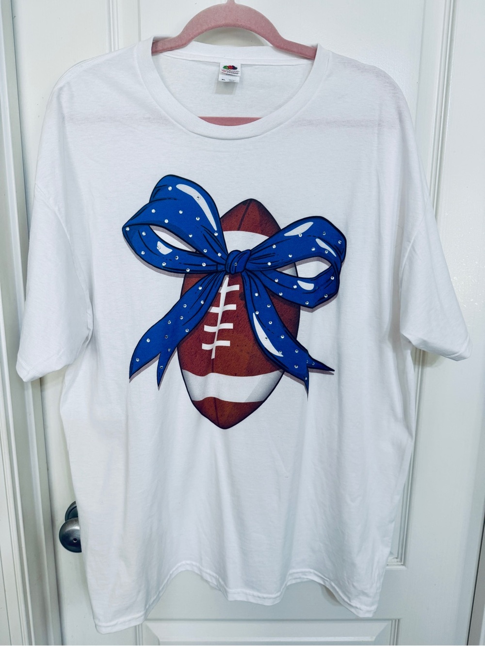 Unbranded Women’s  White T-Shirt with Football & Blue Bow Graphic